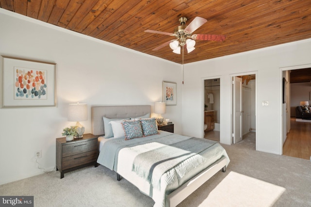 bedroom with light colored carpet, ornamental molding, and wooden ceiling