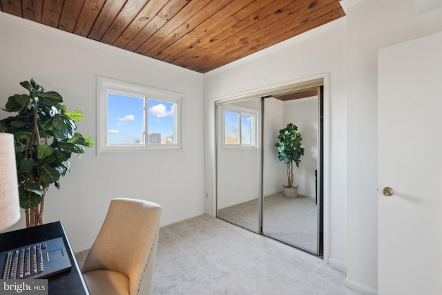 office with crown molding, wood ceiling, and light colored carpet