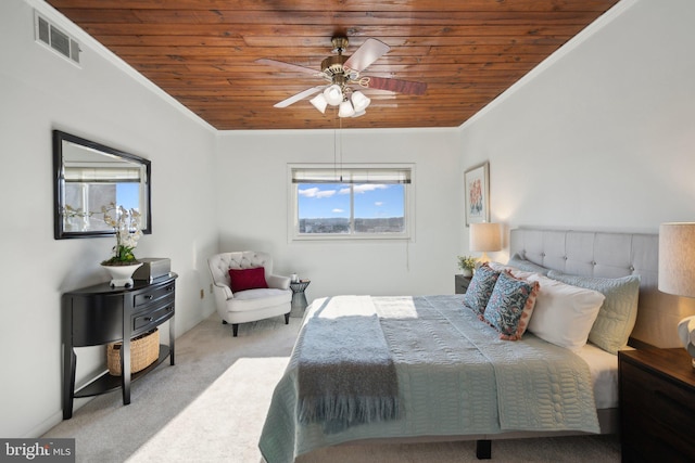 bedroom with ornamental molding, light colored carpet, ceiling fan, and wood ceiling