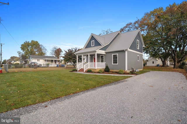 view of front of house featuring a porch and a front lawn