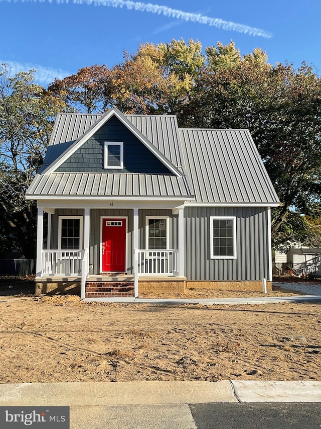 modern farmhouse with a porch