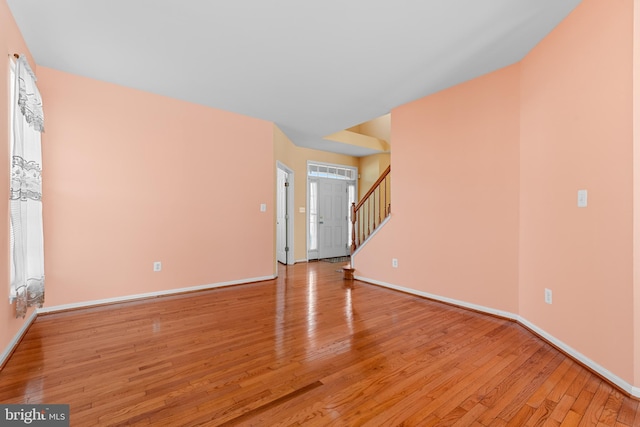 spare room with light hardwood / wood-style flooring