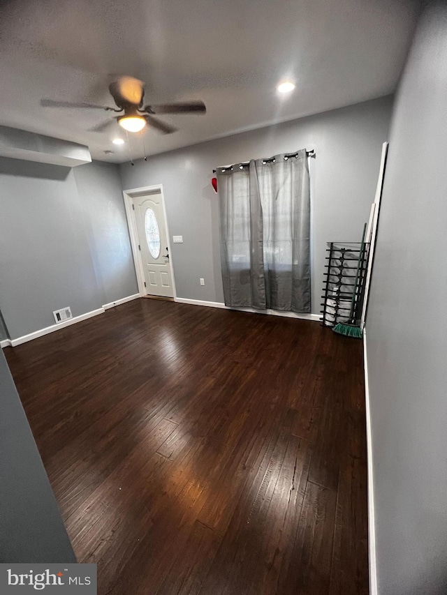 interior space featuring hardwood / wood-style flooring and ceiling fan