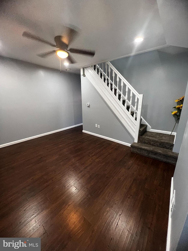 interior space with a textured ceiling, hardwood / wood-style flooring, and ceiling fan