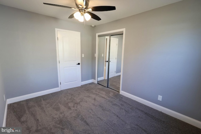 unfurnished bedroom with a closet, ceiling fan, and carpet flooring