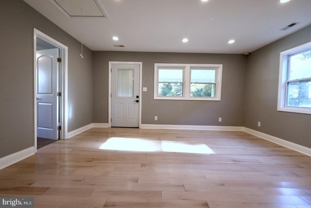 entrance foyer with light hardwood / wood-style floors