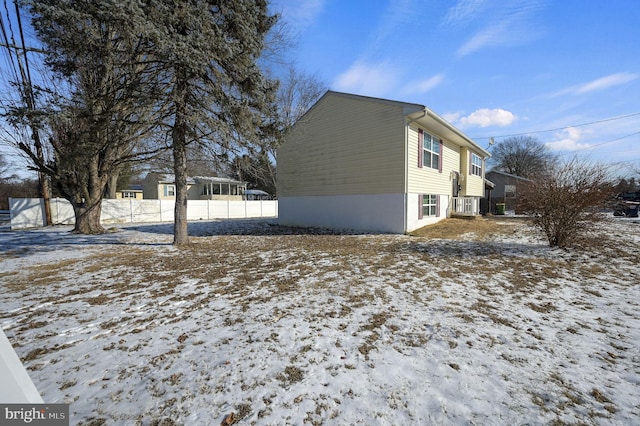 view of snow covered property