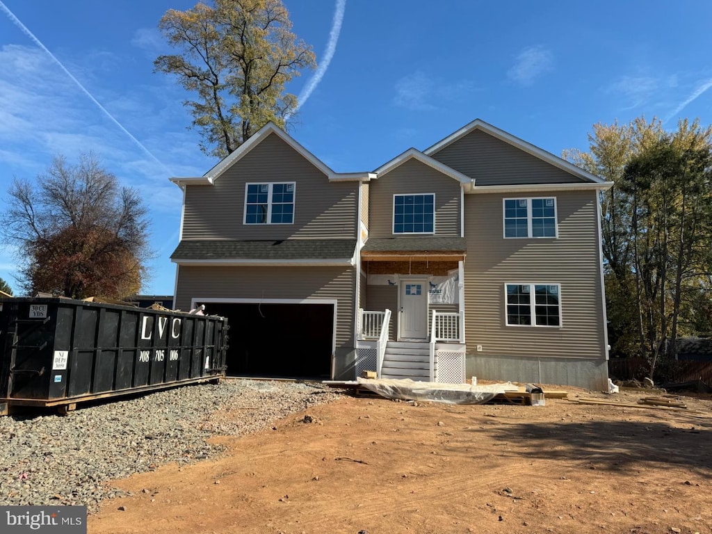 view of front of property featuring a garage