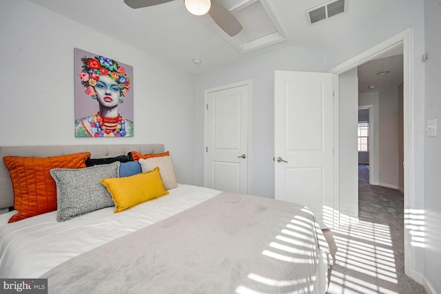 carpeted bedroom with ceiling fan