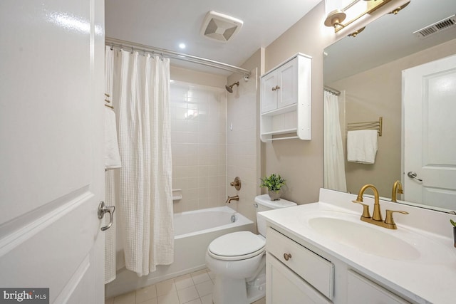 full bathroom with tile patterned flooring, vanity, toilet, and shower / tub combo