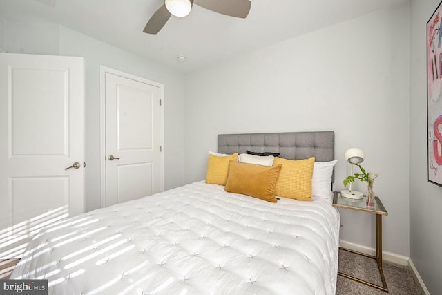 carpeted bedroom with ceiling fan