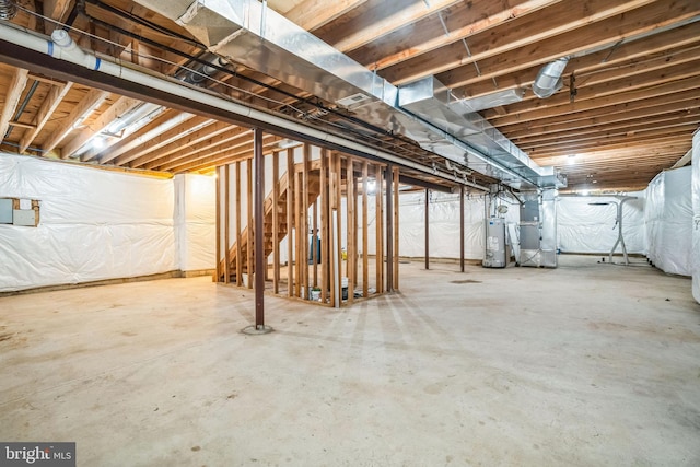 basement with heating unit and water heater