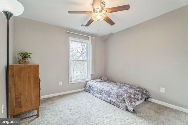 bedroom featuring carpet and ceiling fan