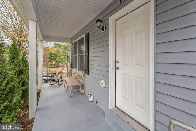 exterior space featuring covered porch