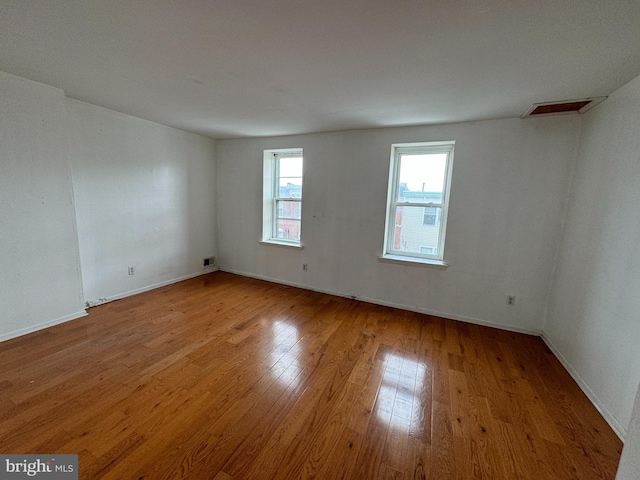 empty room featuring light hardwood / wood-style floors