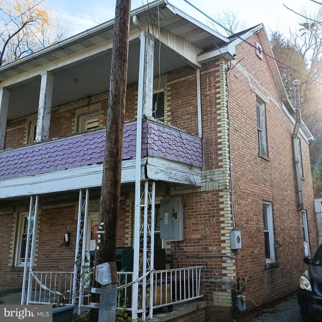 view of home's exterior featuring covered porch