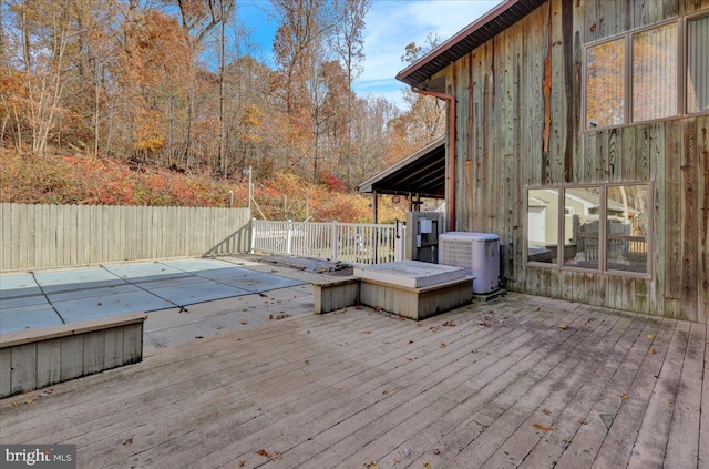 wooden deck featuring central AC