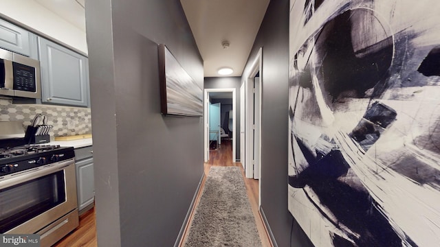 hall featuring dark wood-type flooring