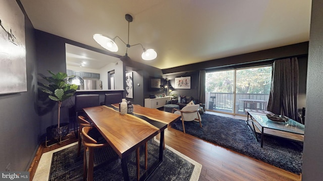 dining room featuring wood-type flooring