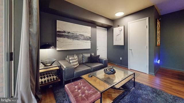 living room featuring dark hardwood / wood-style flooring