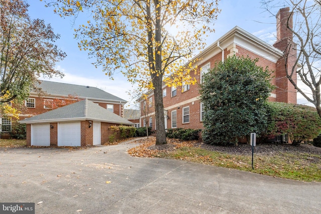 view of property exterior featuring a garage