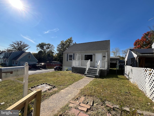 view of front of home with a front lawn