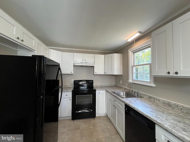 kitchen with crown molding, white cabinetry, black appliances, and sink