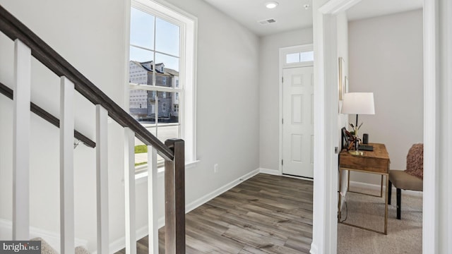 foyer entrance featuring hardwood / wood-style floors