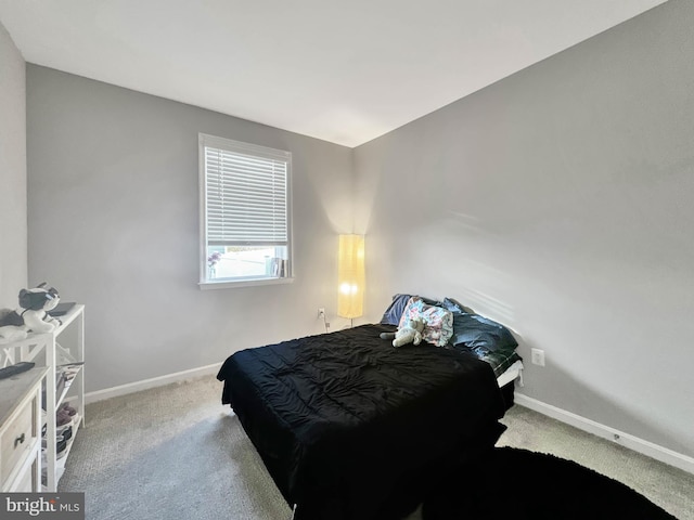 bedroom featuring carpet