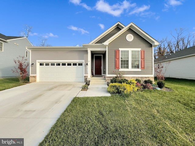 view of front of home featuring a garage and a front lawn