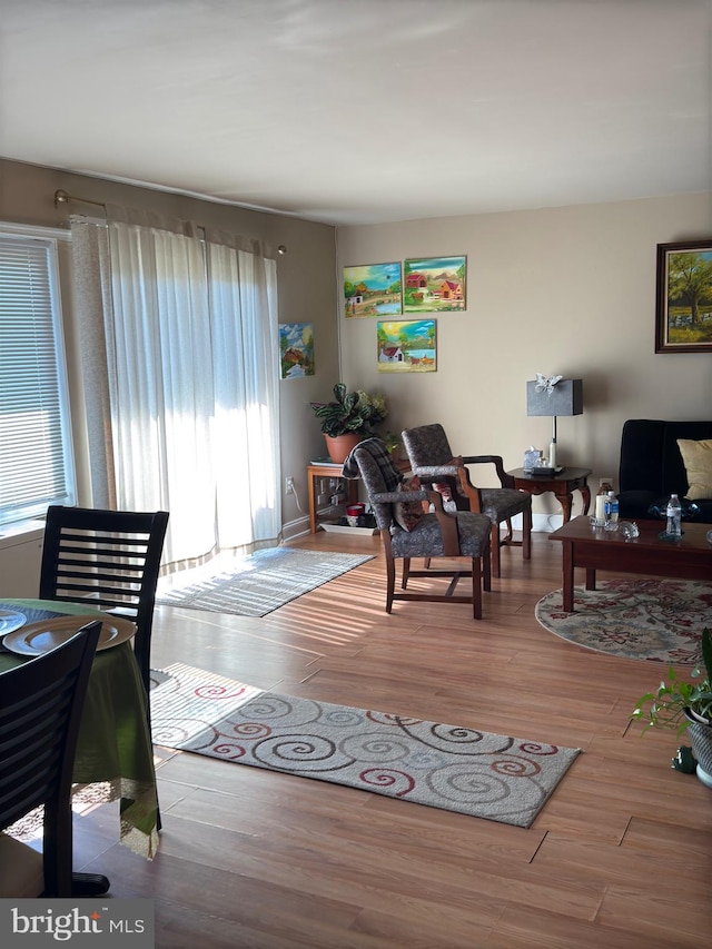 office area with light hardwood / wood-style floors