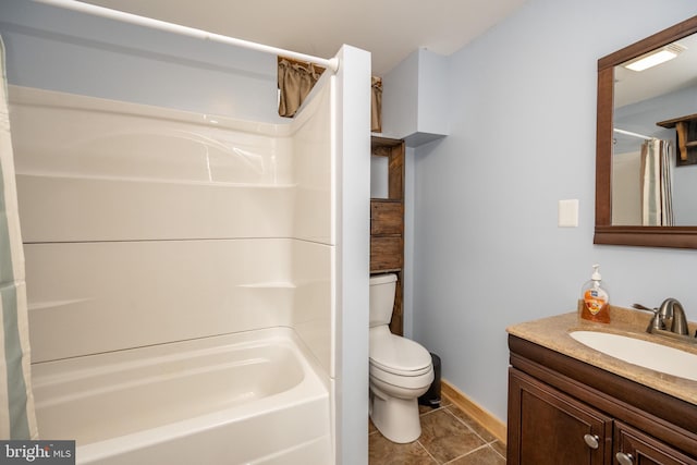 full bathroom with tile patterned flooring, vanity, toilet, and shower / tub combo