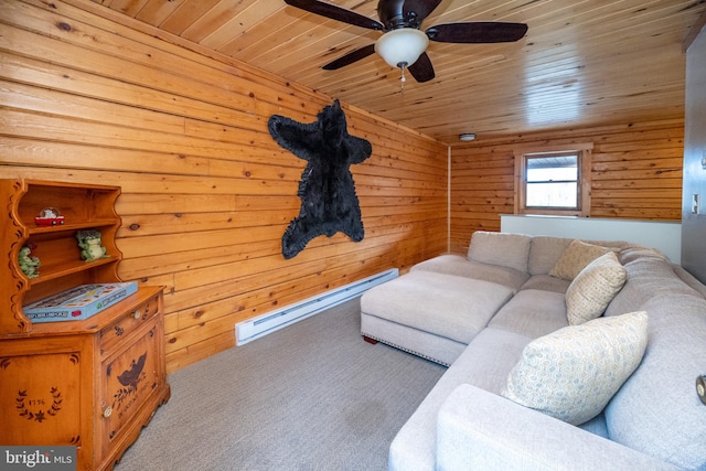 living room with light carpet, wood ceiling, wooden walls, baseboard heating, and ceiling fan