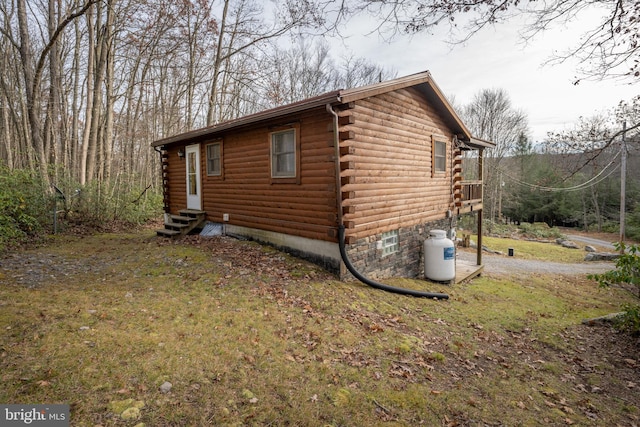 view of property exterior featuring a yard