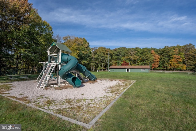 view of jungle gym featuring a yard