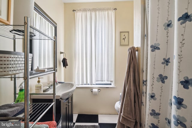 bathroom with vanity and toilet