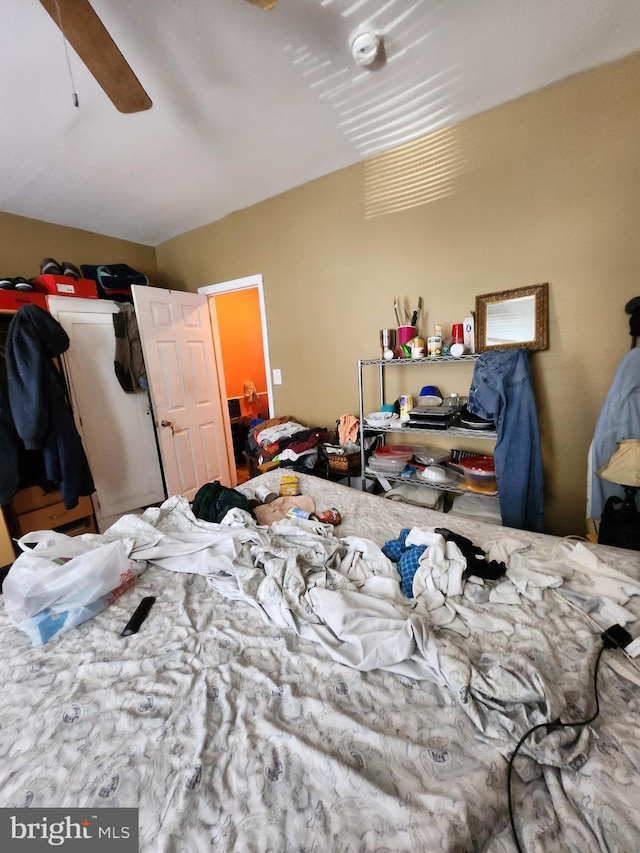 bedroom featuring ceiling fan