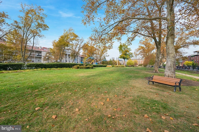 view of community featuring a lawn