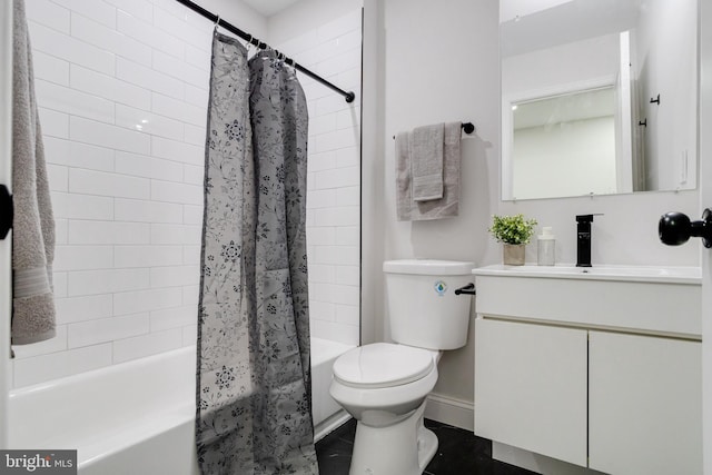 full bathroom with vanity, shower / bath combo, and toilet