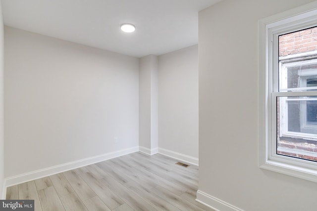 empty room with light wood-type flooring