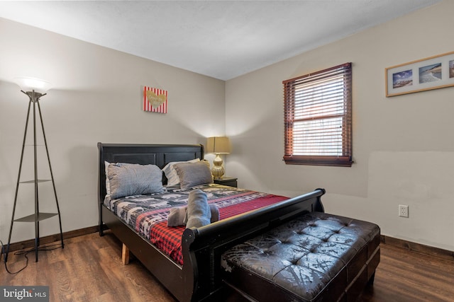 bedroom featuring dark wood-type flooring