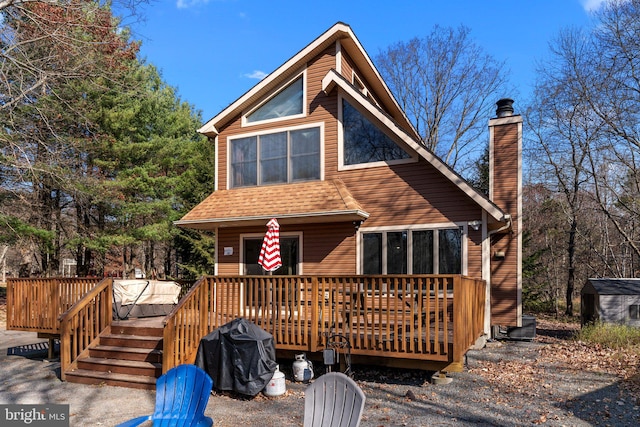 view of front of property featuring a wooden deck