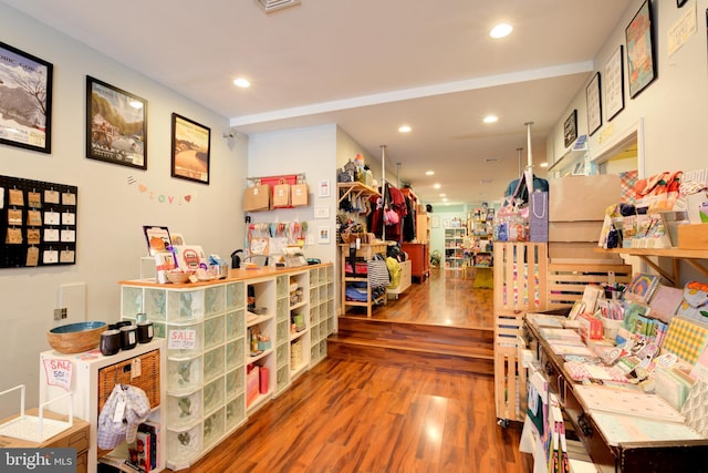 miscellaneous room featuring hardwood / wood-style floors