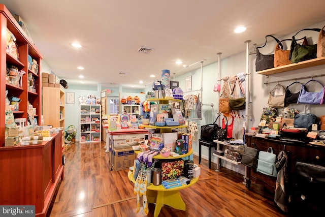 miscellaneous room with hardwood / wood-style floors