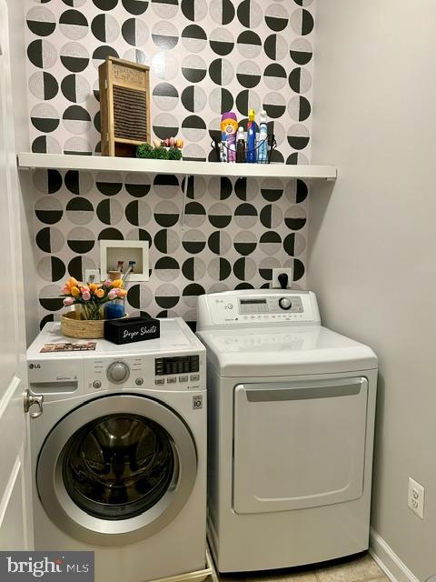 laundry area with washer and dryer