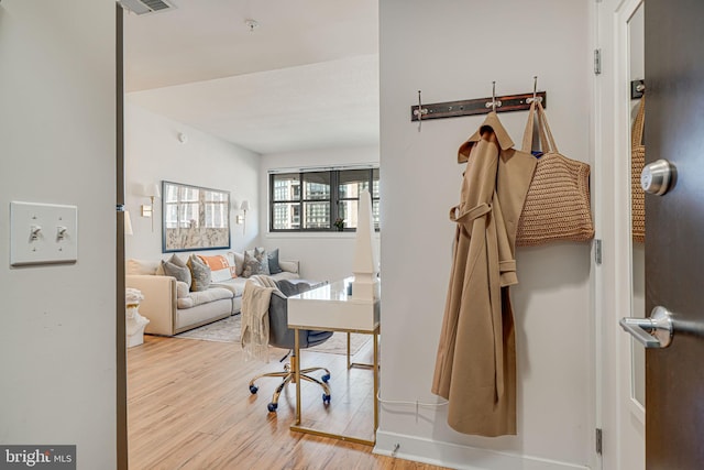 home office with light wood-type flooring