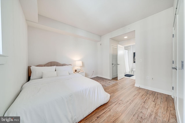 bedroom featuring light hardwood / wood-style flooring