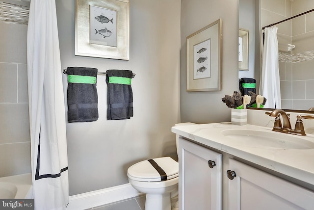 full bathroom featuring vanity, shower / bath combination with curtain, toilet, and tile patterned floors