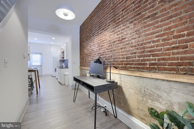 hallway with brick wall