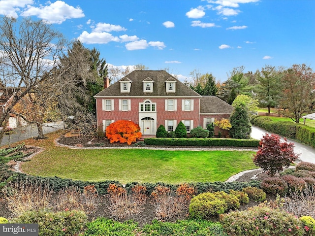 view of front of house with a front lawn